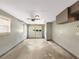 Spacious two car garage with window, white door and gray walls at 2784 Williamsburg Way, Decatur, GA 30034