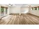 Spacious living room showcasing hardwood floors and French doors at 2784 Williamsburg Way, Decatur, GA 30034