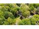 Overhead view of the property showing the boundaries, landscaping and trees at 3402 Johnson Ferry Rd, Roswell, GA 30075