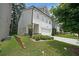 A charming home showcasing a manicured lawn and beautiful exterior at 4450 Richmond Ct, Stone Mountain, GA 30083