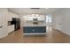 Well-appointed kitchen featuring a large center island with modern appliances at 4450 Richmond Ct, Stone Mountain, GA 30083