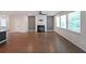 Bright living room features modern fireplace and lots of natural light at 4450 Richmond Ct, Stone Mountain, GA 30083