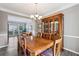Dining room with hardwood floors and view to living room at 10300 Medridge Cir, Johns Creek, GA 30022