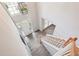 View of the foyer featuring hardwood floors and a staircase at 10300 Medridge Cir, Johns Creek, GA 30022