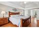 Main bedroom with hardwood floors and recessed lights at 10300 Medridge Cir, Johns Creek, GA 30022
