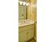 Bathroom features a marble countertop and updated vanity with modern fixtures at 2212 Mcquiston Sw Dr, Marietta, GA 30064