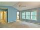 Bright bedroom featuring an ensuite bathroom and large windows with natural light at 2212 Mcquiston Sw Dr, Marietta, GA 30064