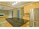 Eat-in kitchen features stainless steel appliances, granite island and view to the Gathering room at 2212 Mcquiston Sw Dr, Marietta, GA 30064
