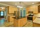 Well-equipped kitchen with stainless appliances, an island, and ample cabinet space at 2212 Mcquiston Sw Dr, Marietta, GA 30064