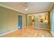 Open-concept living room features wood floors and a view to the eat-in kitchen at 2212 Mcquiston Sw Dr, Marietta, GA 30064