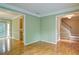 Bright living room with hardwood floors, neutral walls, and classic trim at 2212 Mcquiston Sw Dr, Marietta, GA 30064
