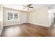 Spacious living room with sleek wood floors, a ceiling fan, and plenty of natural light at 2912 Springside Se, Atlanta, GA 30354