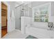 Bright bathroom with soaking tub and separate glass shower at 3541 Roswell Ne Rd # 21, Atlanta, GA 30305