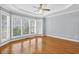 Bright and spacious bedroom with large windows, crown molding, and hardwood floors at 3541 Roswell Ne Rd # 21, Atlanta, GA 30305