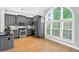 Modern kitchen featuring stainless steel appliances, and a beautiful arched window providing plenty of natural light at 3541 Roswell Ne Rd # 21, Atlanta, GA 30305