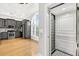 Modern kitchen and in-home elevator, featuring stainless steel appliances and a light wood floor at 3541 Roswell Ne Rd # 21, Atlanta, GA 30305