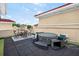 Rooftop patio with dining area, lounge furniture, and a hot tub under string lights at 3541 Roswell Ne Rd # 21, Atlanta, GA 30305