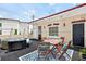 Rooftop patio area with dining table and seating, a hot tub and entry door at 3541 Roswell Ne Rd # 21, Atlanta, GA 30305