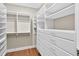 Well-organized walk-in closet with shelving, drawers, and hanging rods at 3541 Roswell Ne Rd # 21, Atlanta, GA 30305