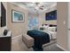 Comfortable bedroom with a large bed, soft carpet, and natural light, creating a relaxing atmosphere at 1850 Cotillion Dr # 3305, Dunwoody, GA 30338