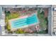 Aerial view of community pool area, surrounded by landscaping and lounge chairs at 1850 Cotillion Dr # 3305, Dunwoody, GA 30338