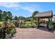 Deck with covered swing and lush landscaping at 1951 Chambers Rd, Mcdonough, GA 30253