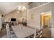 Open-concept dining area provides a view to the living room, creating a welcoming and spacious atmosphere at 1951 Chambers Rd, Mcdonough, GA 30253