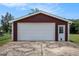 Detached garage with white door and separate entry at 1951 Chambers Rd, Mcdonough, GA 30253