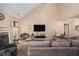 Inviting living room features neutral walls, plush seating, and a cozy fireplace, perfect for relaxing and entertaining at 1951 Chambers Rd, Mcdonough, GA 30253