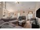 Spacious living room features a fireplace, vaulted ceilings, and comfortable seating area at 1951 Chambers Rd, Mcdonough, GA 30253