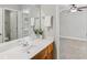 This bathroom vanity features dual sinks and opens to the Primary bedroom at 4546 Water Mill Dr, Buford, GA 30519