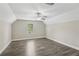 Bright bedroom with ceiling fan, hardwood flooring and natural light at 4546 Water Mill Dr, Buford, GA 30519