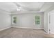 This bedroom features trey ceilings and natural light from the windows at 4546 Water Mill Dr, Buford, GA 30519