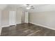 Spacious bedroom with closet space and neutral paint color at 4546 Water Mill Dr, Buford, GA 30519