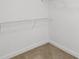 This is a walk-in closet at 4546 Water Mill Dr, Buford, GA 30519