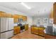 Beautiful kitchen with stainless steel appliances, granite countertops, and wooden cabinets at 4546 Water Mill Dr, Buford, GA 30519