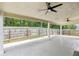 Covered patio with concrete flooring and ceiling fans, ideal for outdoor relaxation at 4546 Water Mill Dr, Buford, GA 30519