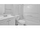 Clean bathroom featuring a shower and tub combo, along with vanity at 5653 Bradley Cir, Lithonia, GA 30038