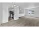 Spacious living room with updated carpet and natural light near kitchen at 5653 Bradley Cir, Lithonia, GA 30038