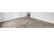 Living room featuring neutral paint and plush carpeting leading to doorway at 5653 Bradley Cir, Lithonia, GA 30038