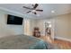 Bedroom suite with a television, a leather recliner, and an ensuite bathroom at 114 Trinity Hollow Dr, Canton, GA 30115