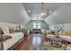 Open bonus room featuring multiple beds, unique decor, hardwood floors, and great natural light at 114 Trinity Hollow Dr, Canton, GA 30115