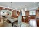 Spacious kitchen with island and breakfast bar, flowing into elegant dining area at 114 Trinity Hollow Dr, Canton, GA 30115