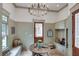 Inviting mudroom with custom cabinetry, seating, stylish lighting, and convenient access to the exterior at 114 Trinity Hollow Dr, Canton, GA 30115