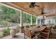 Inviting outdoor dining area on the porch, perfect for entertaining at 114 Trinity Hollow Dr, Canton, GA 30115