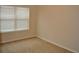 Cozy bedroom featuring a window with natural light and a neutral carpet at 1530 Horseshoe Creek Ln, Cumming, GA 30041
