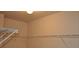 Walk-in closet with basic metal shelving for storage at 1530 Horseshoe Creek Ln, Cumming, GA 30041