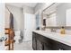 Modern bathroom with a sleek vanity, ample storage, and a shower with a tiled surround, providing a spa-like experience at 1993 Haley Walk, Atlanta, GA 30318
