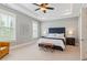 Bright bedroom with a tray ceiling, plush carpet, and large windows, offering a serene retreat at 1993 Haley Walk, Atlanta, GA 30318