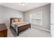 Serene bedroom with a large window and a cozy atmosphere, creating a comfortable retreat at 1993 Haley Walk, Atlanta, GA 30318